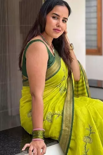 Light green blended cotton embroidered zari work saree with blouse