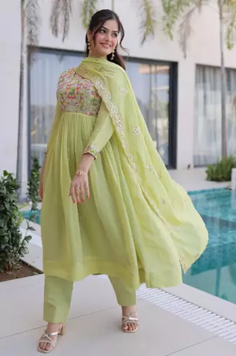 Pista green mal chanderi embroidery zari sequins flared salwar suits