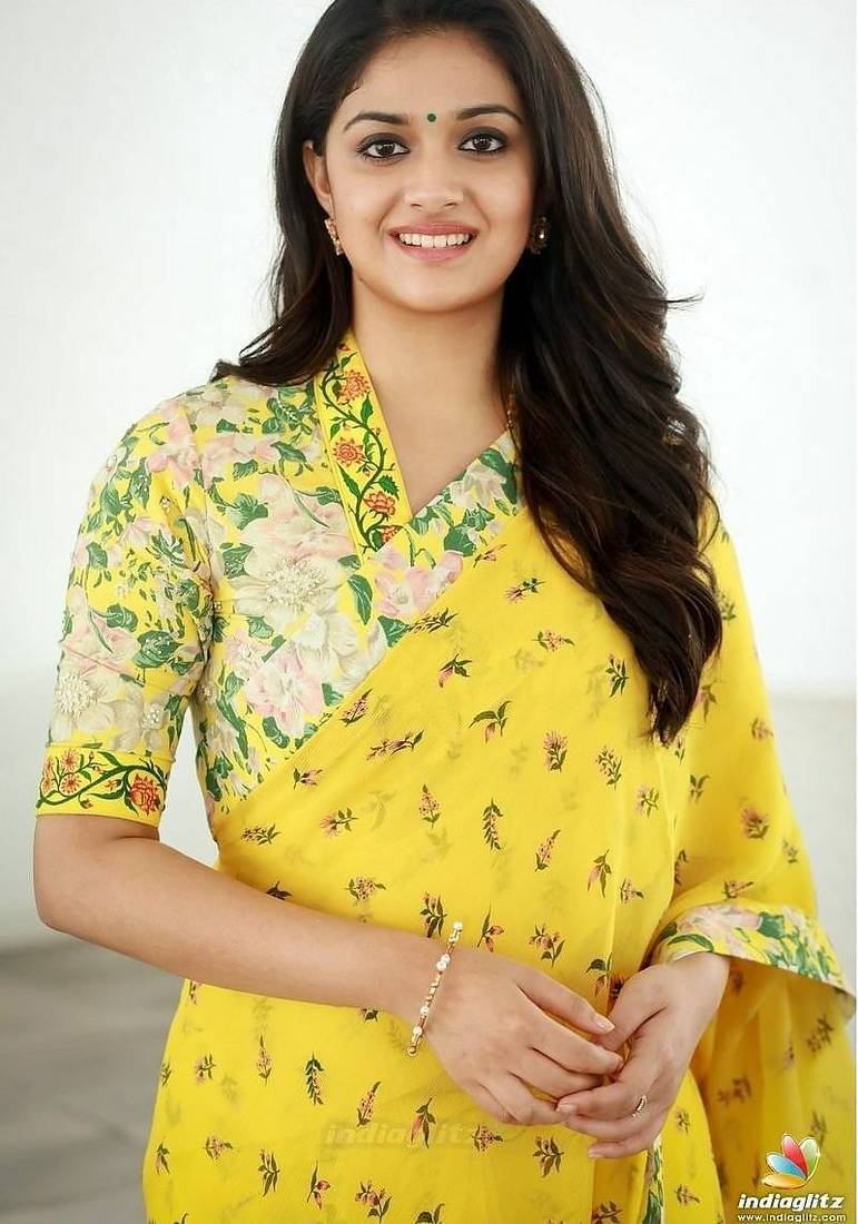 Yellow georgette printed zari work saree with blouse