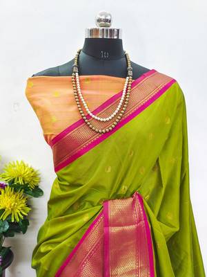 Dark green pure silk woven zari work saree with blouse 1