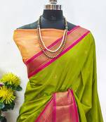 Dark green pure silk woven zari work saree with blouse