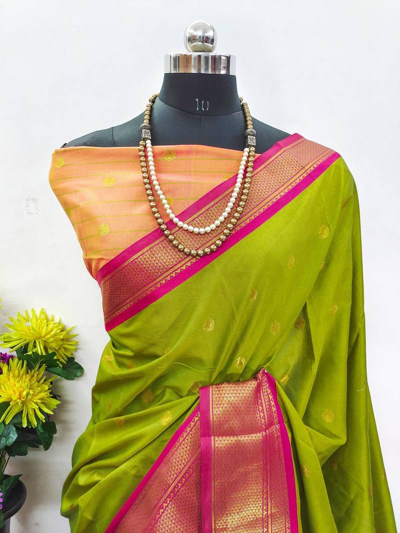 Dark green pure silk woven zari work saree with blouse
