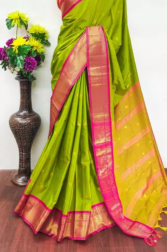 Dark green pure silk woven zari work saree with blouse