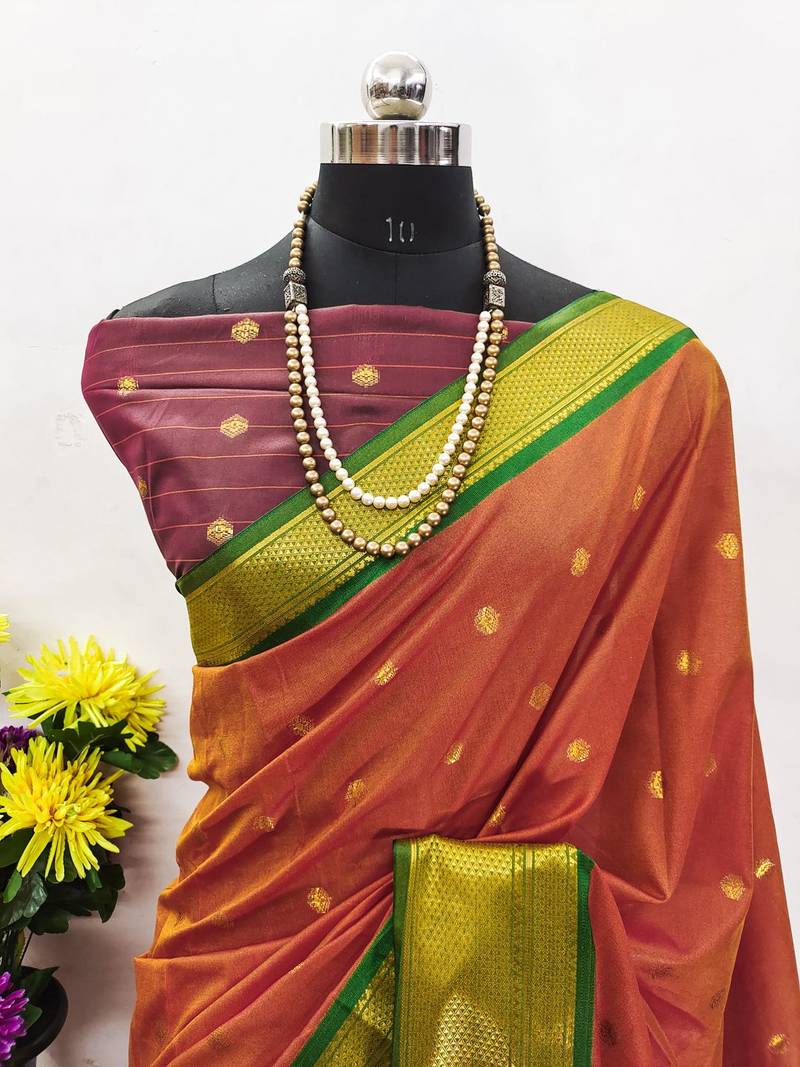 Orange pure silk woven zari work saree with blouse