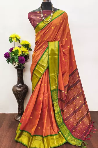 Orange pure silk woven zari work saree with blouse