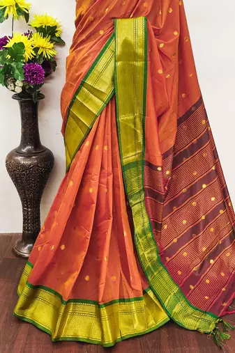 Orange pure silk woven zari work saree with blouse