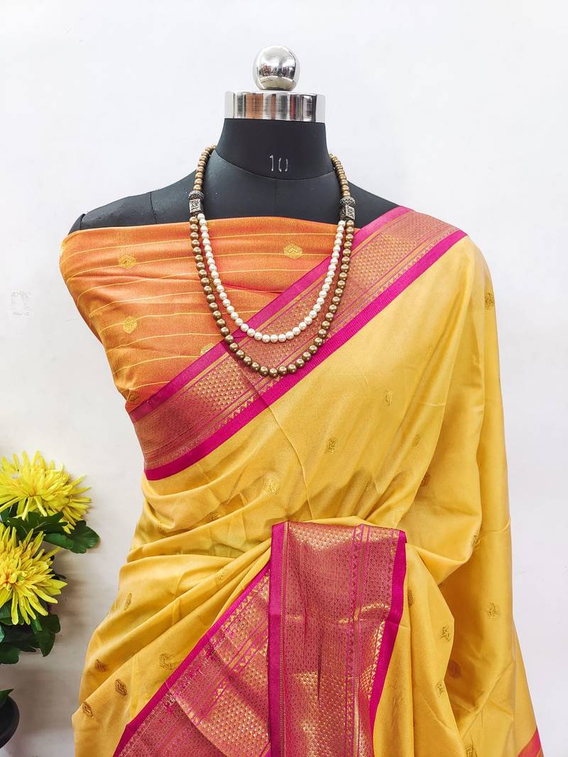 Yellow pure silk woven zari work saree with blouse