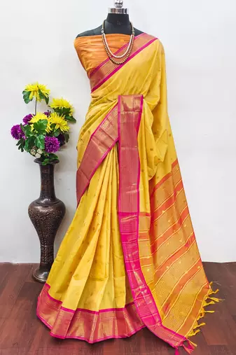 Yellow pure silk woven zari work saree with blouse