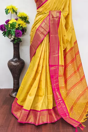 Yellow pure silk woven zari work saree with blouse