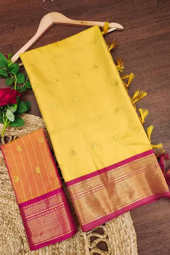 Yellow pure silk woven zari work saree with blouse