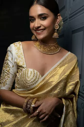 Gold silk blend woven zari work saree with blouse