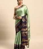 Dark green blended cotton woven zari work saree with blouse