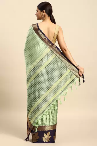 Dark green blended cotton woven zari work saree with blouse