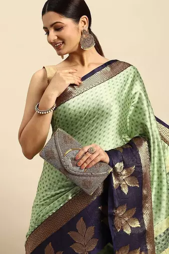 Dark green blended cotton woven zari work saree with blouse