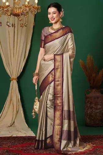 Beige blended cotton woven zari work saree with blouse