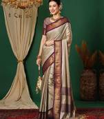 Beige blended cotton woven zari work saree with blouse