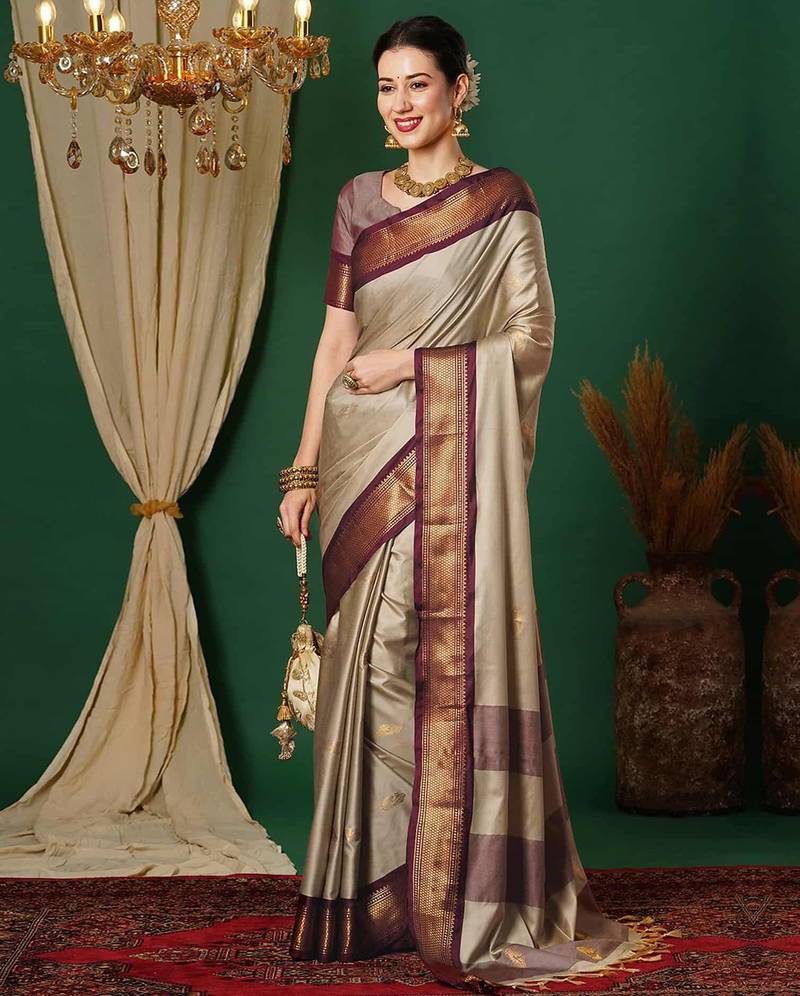 Beige blended cotton woven zari work saree with blouse