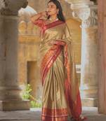 Beige blended cotton woven zari work saree with blouse