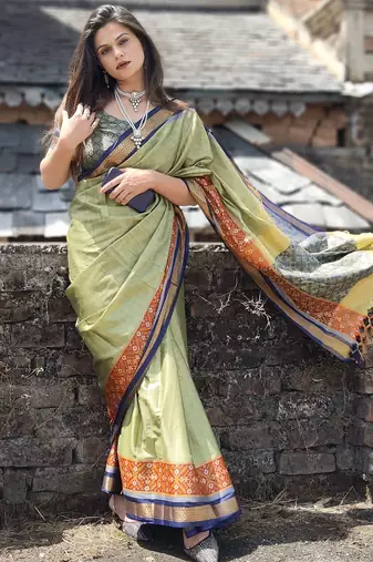 Green blended cotton woven zari work saree with blouse