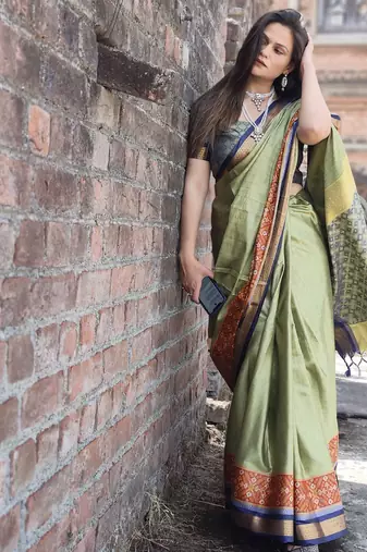 Green blended cotton woven zari work saree with blouse
