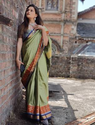 Green blended cotton woven zari work saree with blouse 3