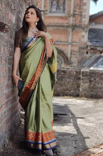 Green blended cotton woven zari work saree with blouse