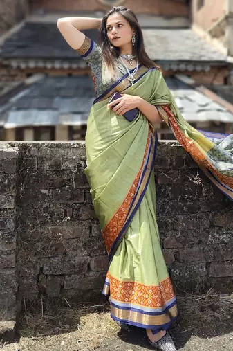 Green blended cotton woven zari work saree with blouse