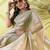 Beige chiffon woven zari work saree with blouse