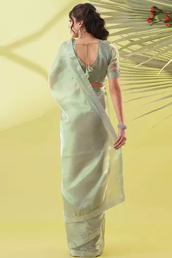 Dark green chiffon woven zari work saree with blouse