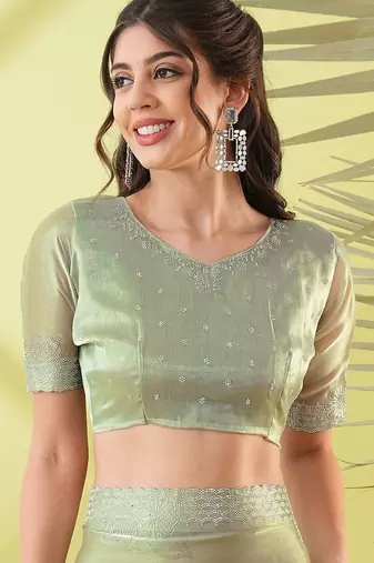 Dark green chiffon woven zari work saree with blouse