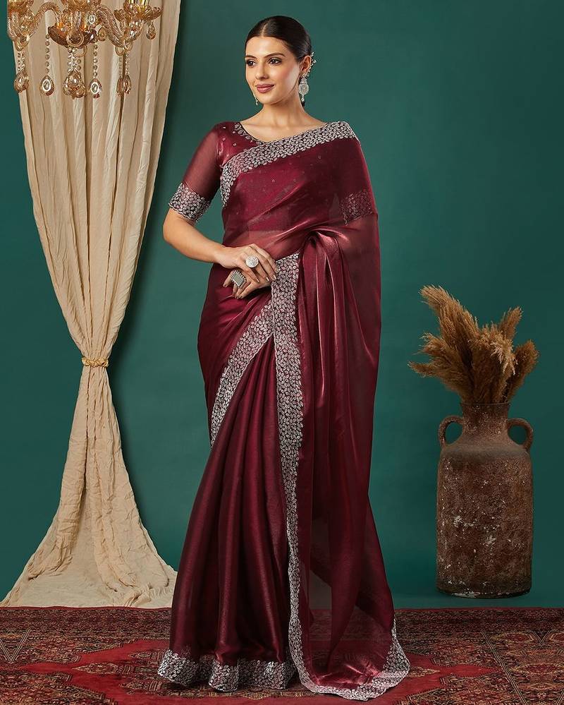 Maroon organza woven zari work saree with blouse