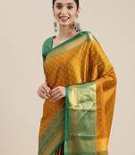 Gold green blended cotton woven zari work saree with blouse