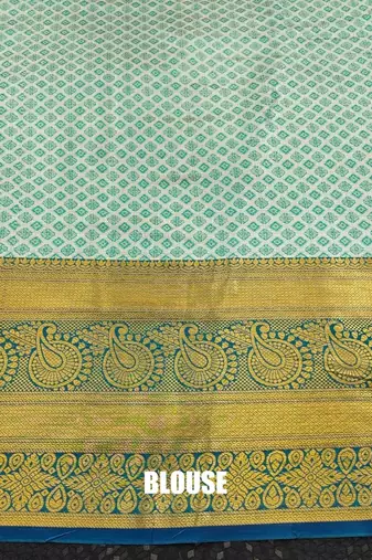 Dark green pure silk printed zari work saree with blouse