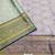 Dark green pure silk printed zari work saree with blouse