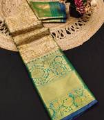 Dark green jacquard woven zari work saree with blouse