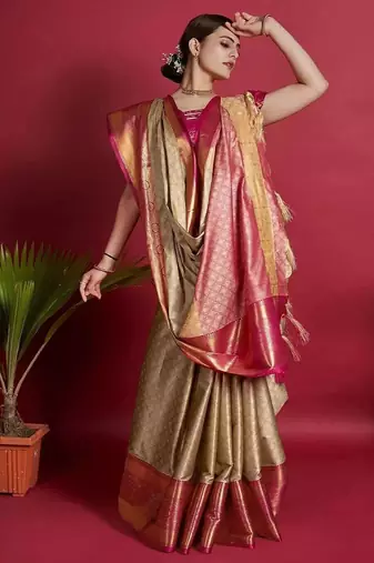 Beige blended cotton woven zari work saree with blouse