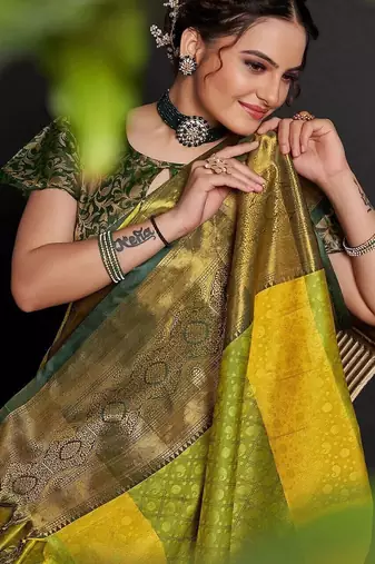 Green blended cotton woven zari work saree with blouse