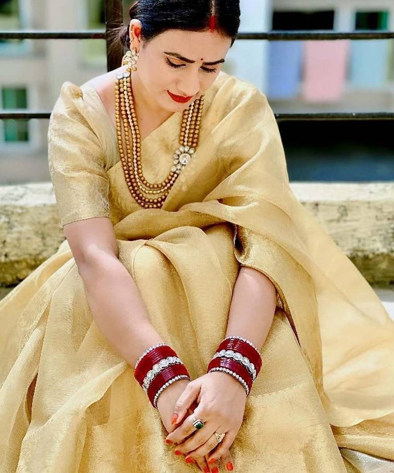 Beige gold tissue woven zari work saree with blouse