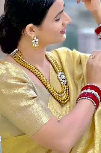 Beige gold tissue woven zari work saree with blouse