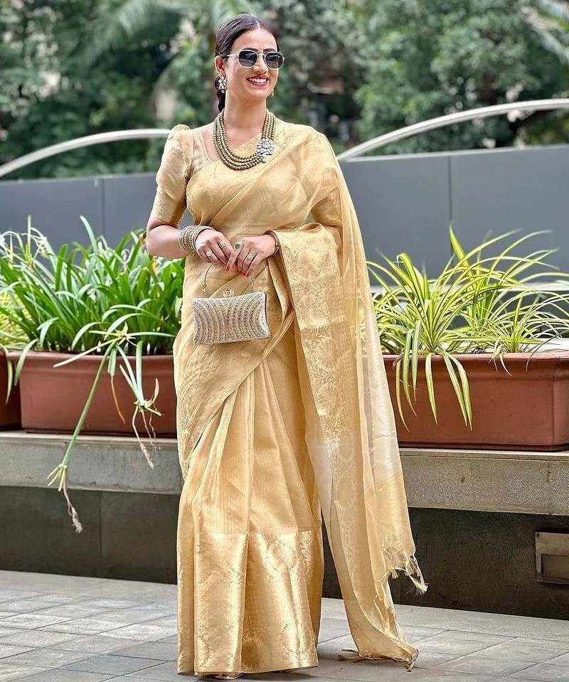 Beige gold tissue woven zari work saree with blouse