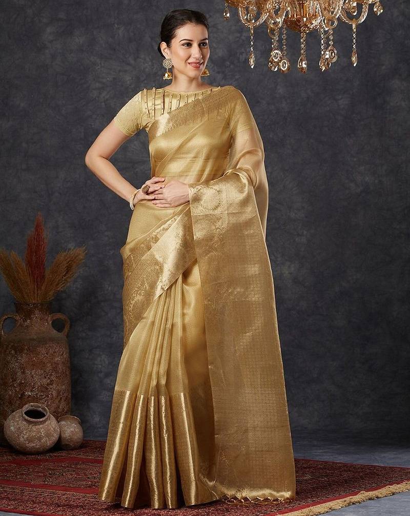 Beige tissue woven zari work saree with blouse