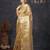 Beige tissue woven zari work saree with blouse