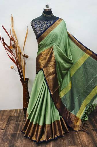 Dark green pure cotton woven zari work saree with blouse