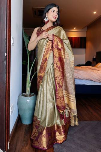 Beige blended cotton woven zari work saree with blouse