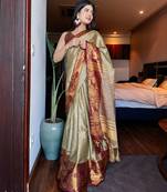 Beige blended cotton woven zari work saree with blouse
