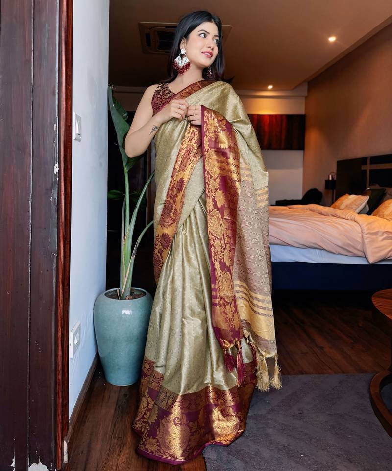 Beige blended cotton woven zari work saree with blouse