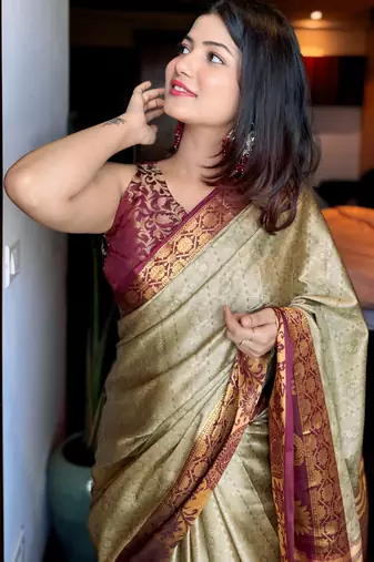 Beige blended cotton woven zari work saree with blouse