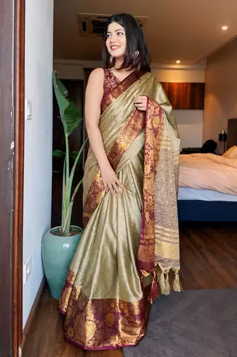 Beige blended cotton woven zari work saree with blouse