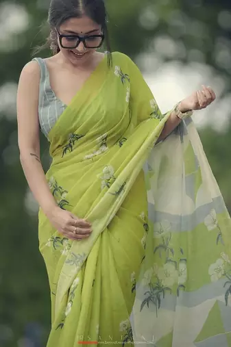 Dark green linen printed zari work saree with blouse