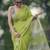 Dark green linen printed zari work saree with blouse
